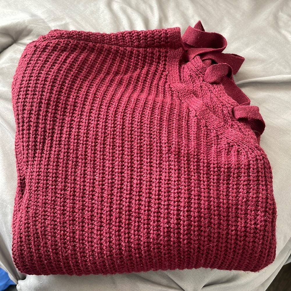 Rue 21 maroon sweater with a braided back